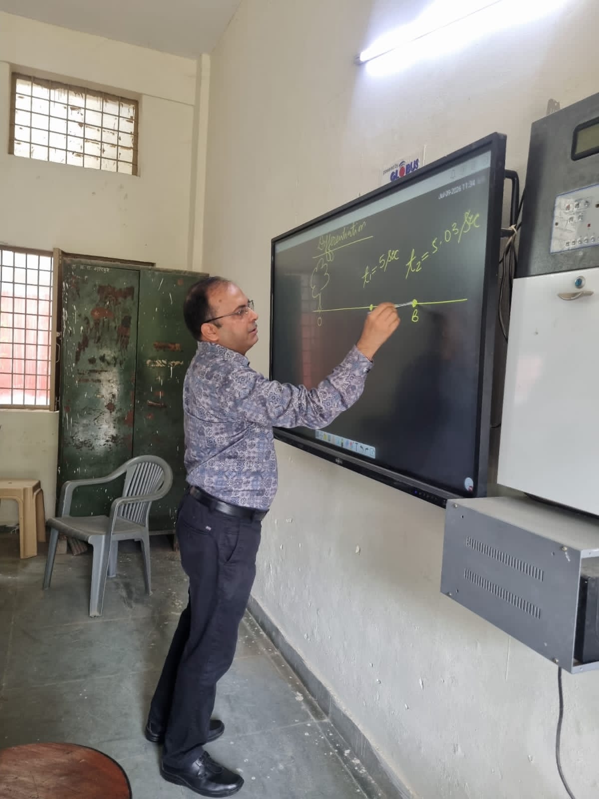 Students and teacher engaged in classroom learning