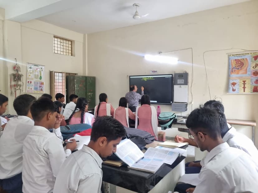 Students and teacher engaged in classroom learning